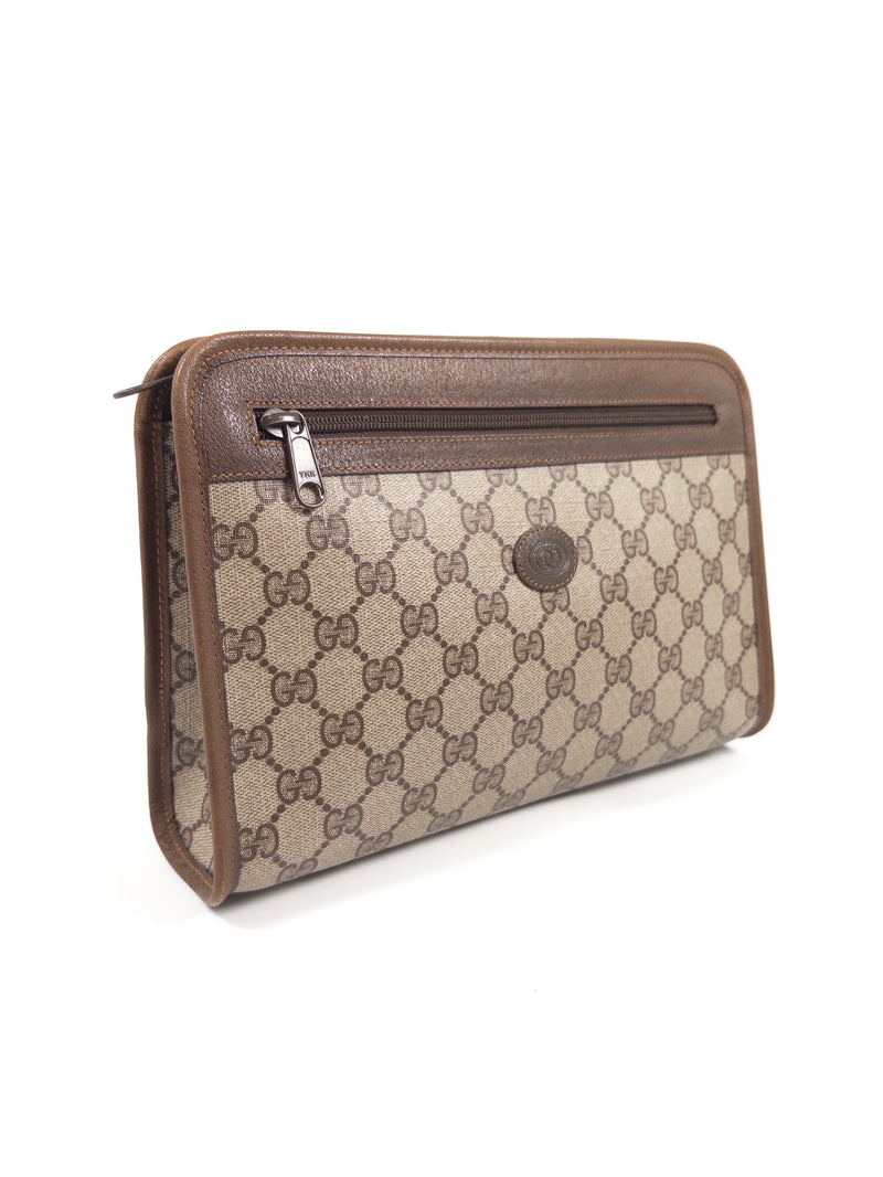 Gucci GG Supreme clutch bag