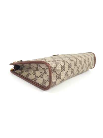 Gucci GG Supreme Clutch Bag