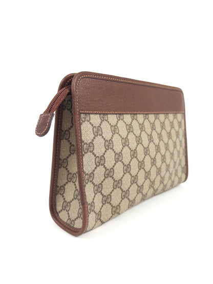 Gucci GG Supreme Clutch Bag
