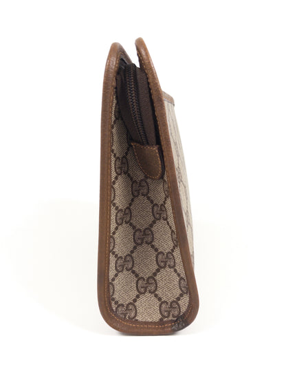 Gucci GG Supreme clutch bag