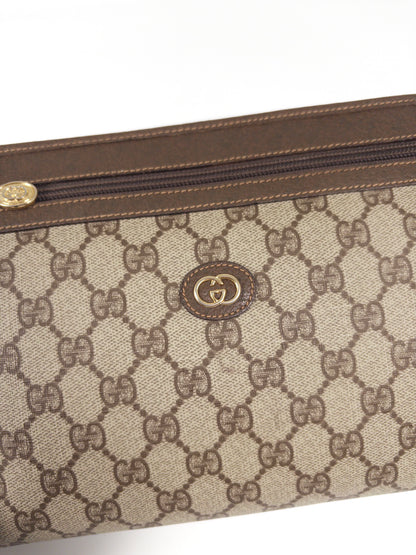 Gucci GG Supreme Clutch Bag