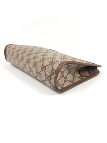 Gucci GG Supreme clutch bag
