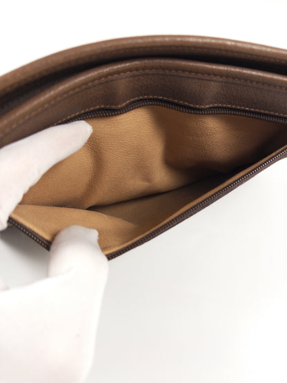 Gucci GG Supreme clutch bag