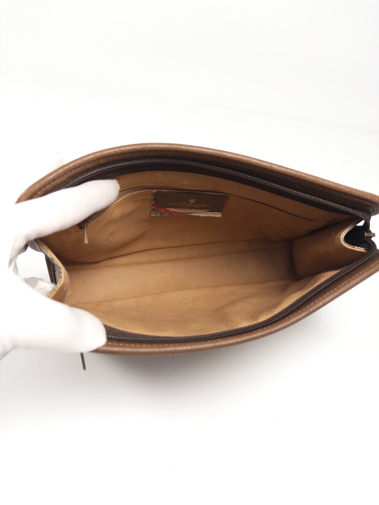 Gucci GG Supreme clutch bag