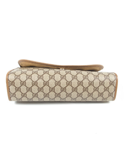 Gucci GG Supreme Clutch Bag