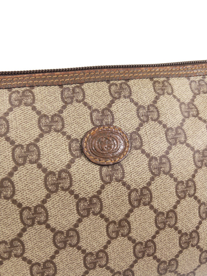 Gucci GG Supreme Clutch Bag