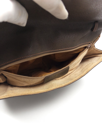 Gucci GG Supreme Clutch bag
