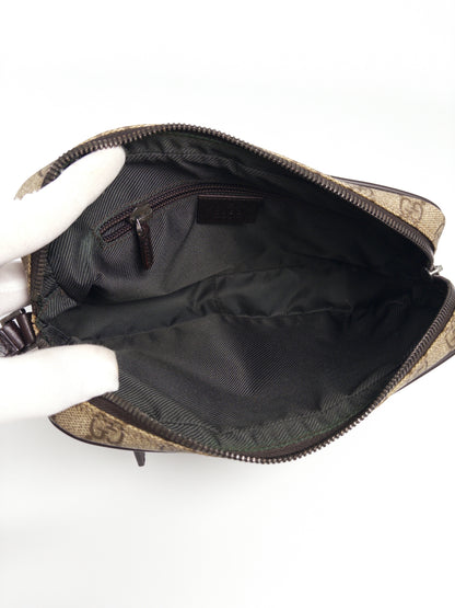 Gucci GG Supreme Clutch Bag